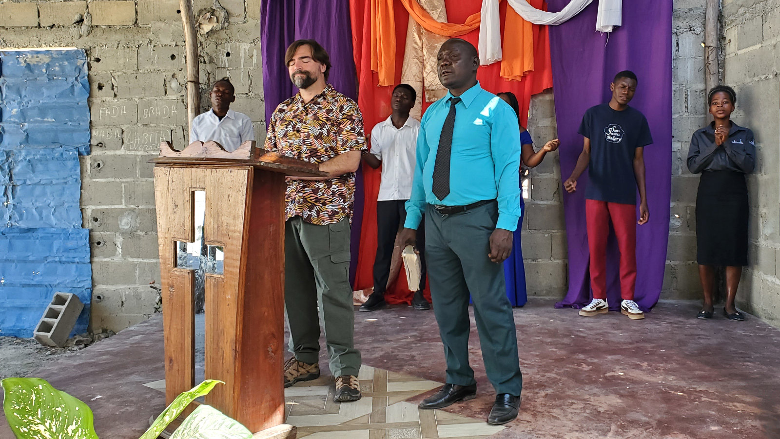 Jason and Abel leading worship in a church in Mozambique